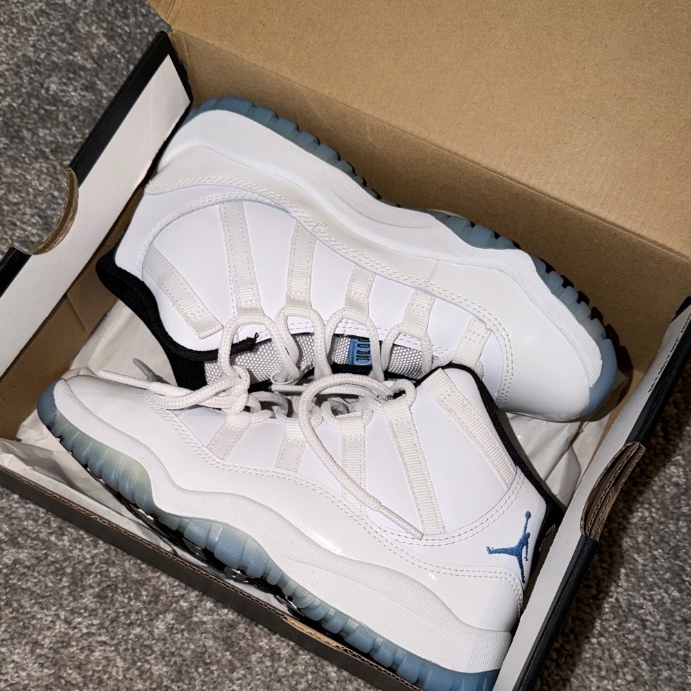 Air Jordan 11 Retro White and Blue Sneakers